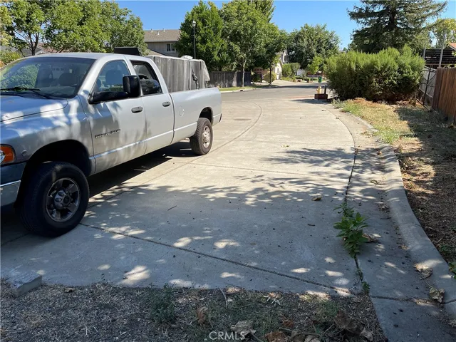 a view of a back yard of a house