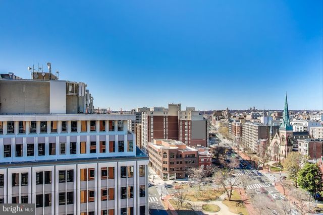 a view of city with tall buildings