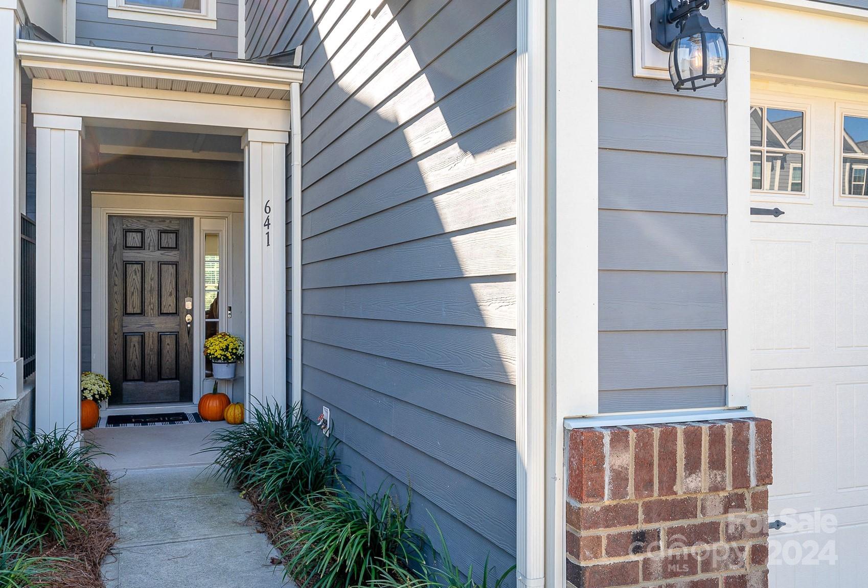 641 Amber Meadows Way Tega Cay, SC 29708 - Photo 2 of 28 a view of front door of house