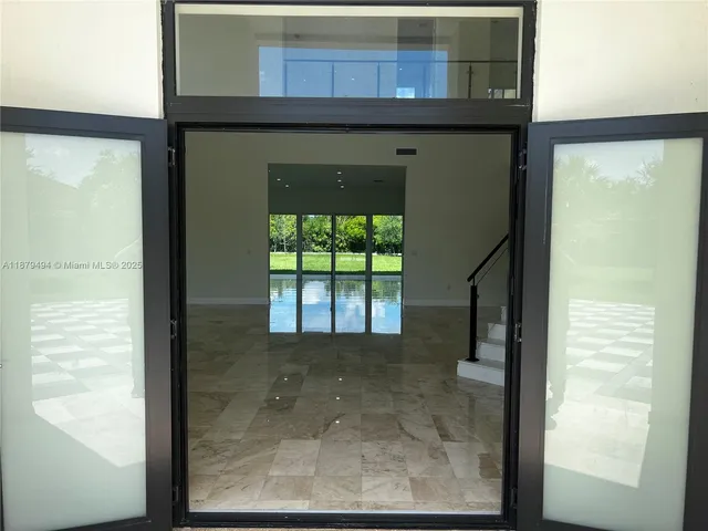 a kitchen with a stove and a sink