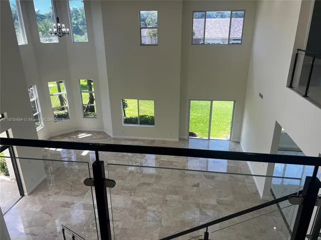 a bathroom with a shower and toilet