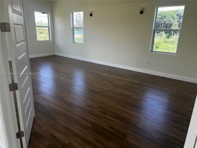 a view of a lake with a garden