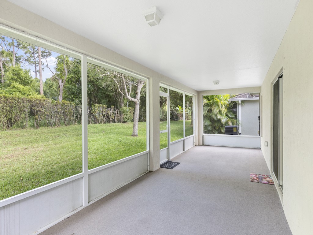 2575 12th Square Southwest Vero Beach, FL 32968 - Photo 21 of 31 a view of outdoor space with porch and windows