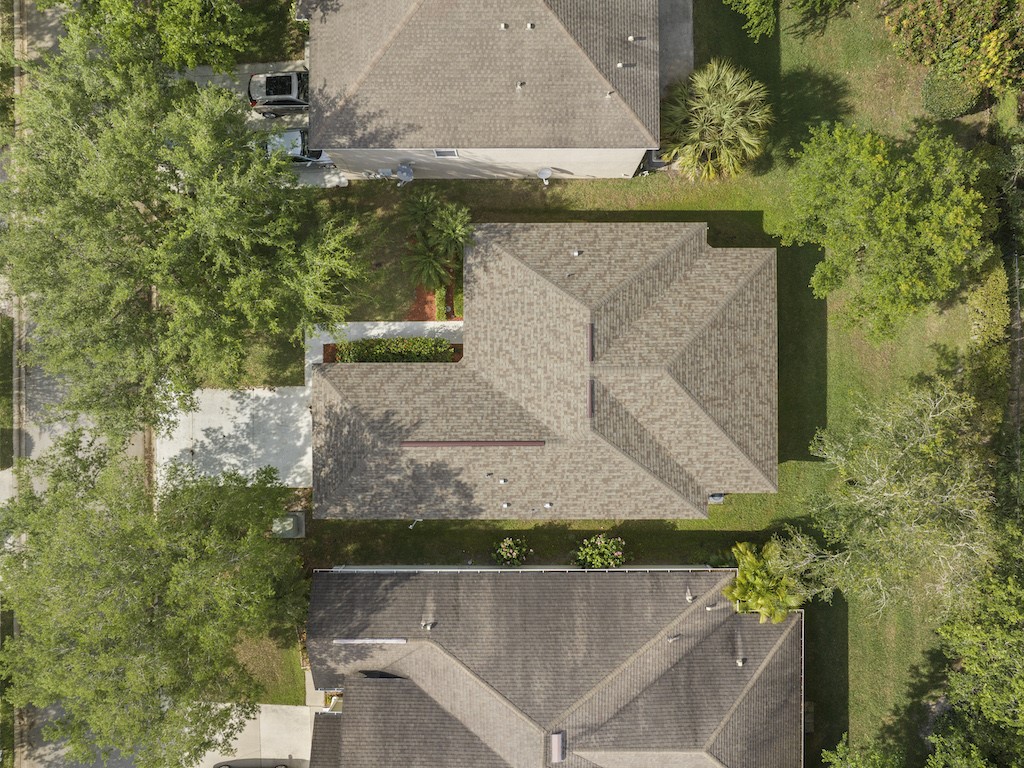 2575 12th Square Southwest Vero Beach, FL 32968 - Photo 26 of 31 an aerial view of a house with a yard