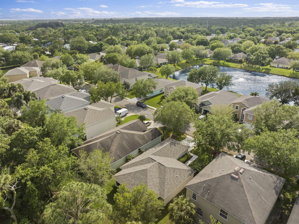 2575 12th Square Southwest Vero Beach, FL 32968 - Photo 27 of 31 an aerial view of a house with a lake view