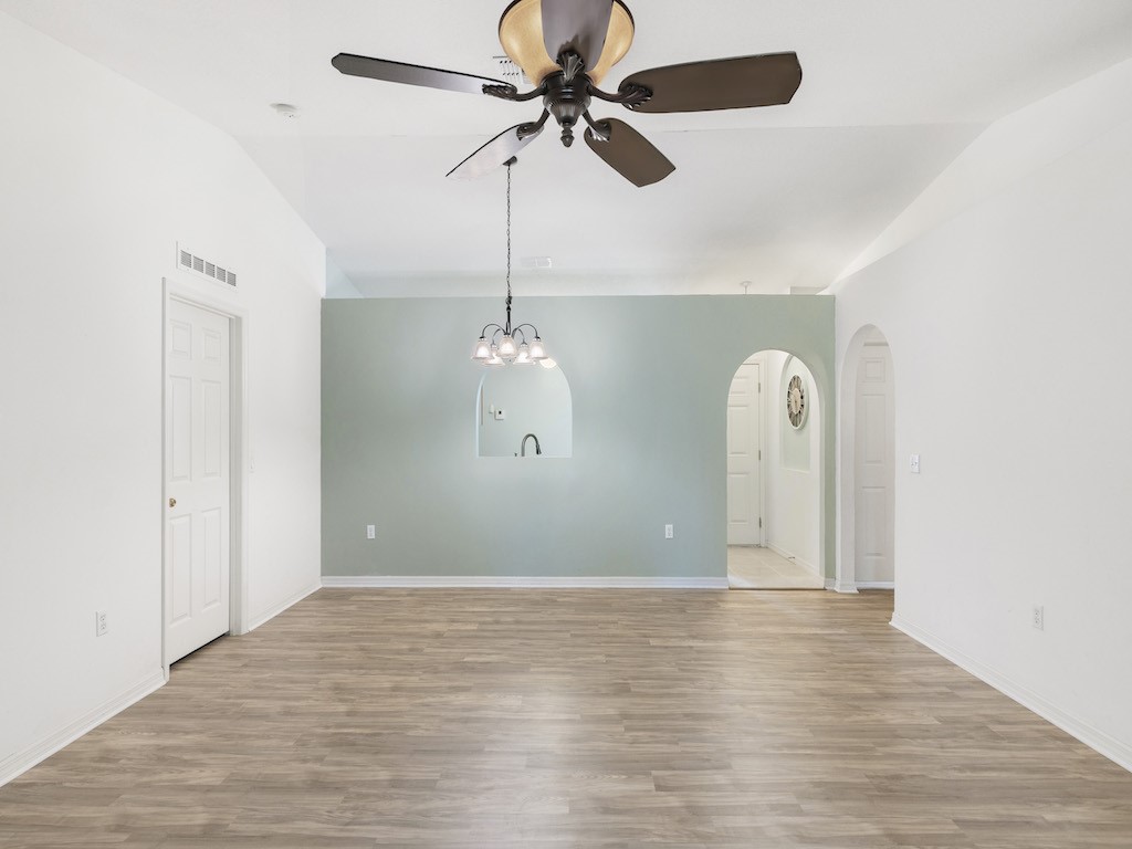 2575 12th Square Southwest Vero Beach, FL 32968 - Photo 10 of 31 a view of room with window and wooden floor