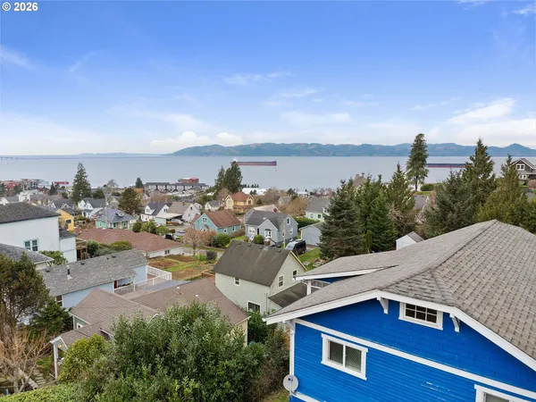 a view of a city with ocean