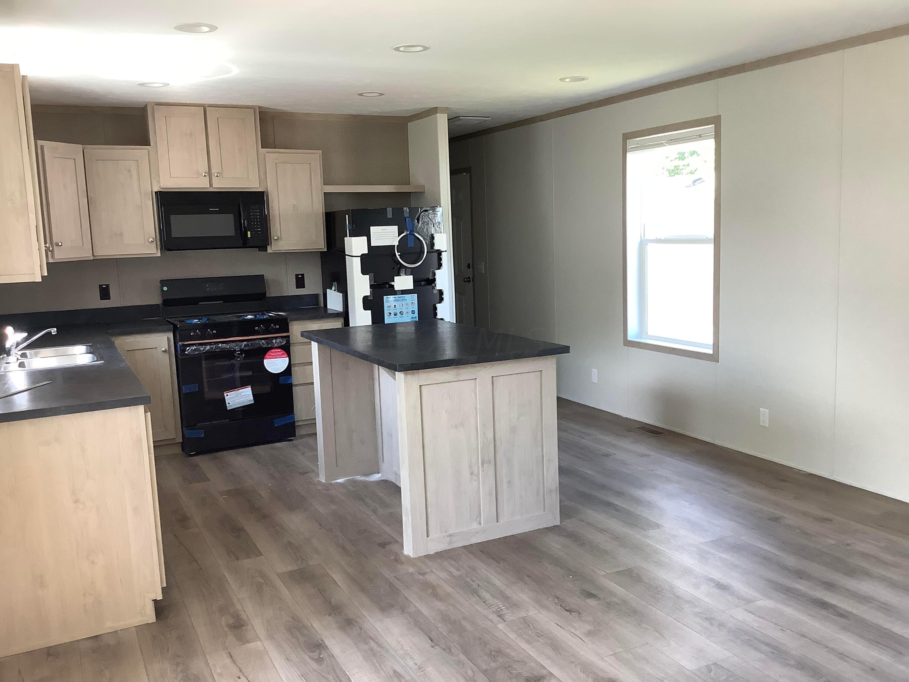8565 Smith-Calhoun Road, Unit 78R Plain City, OH 43064 - Photo 6 of 19 IMG_5411