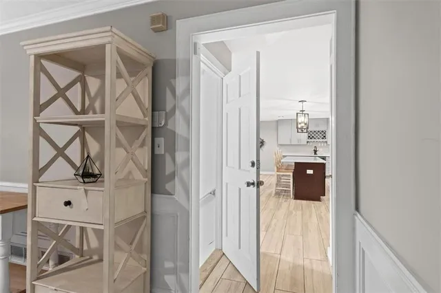 a picture of a bathroom with a shower and a sink