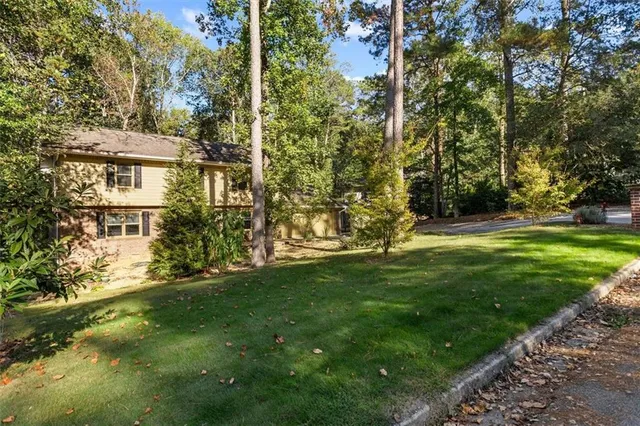 a view of building with yard