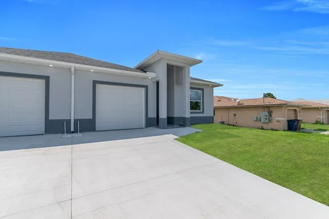 a front view of house with yard
