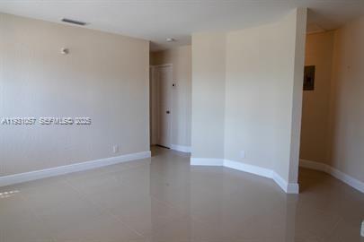 1861 Northwest 59th Way, Unit 2 Sunrise, FL 33313 - Photo 3 of 11 a view of an empty room