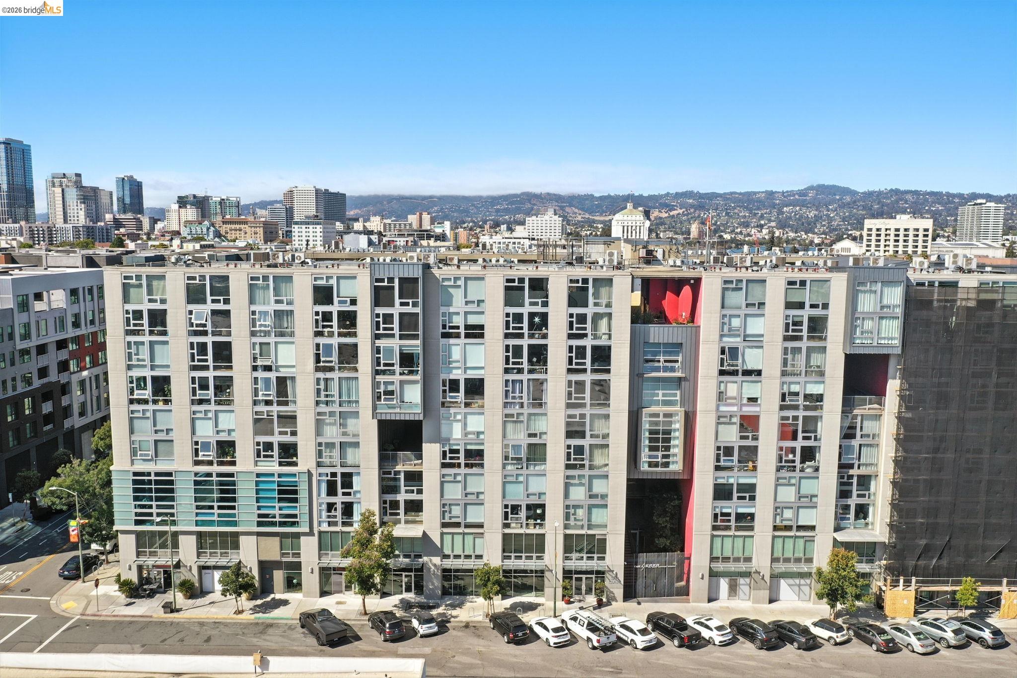 311 Oak Street, Unit 102 Oakland, CA 94607 - Photo 45 of 52 a front view of a building with street view