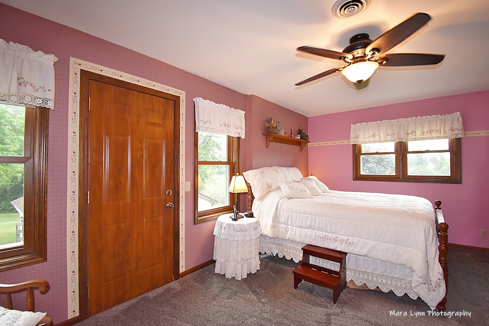 1250 Mettel Road Aurora, IL 60505 - Photo 27 of 49 a bedroom with a bed and window