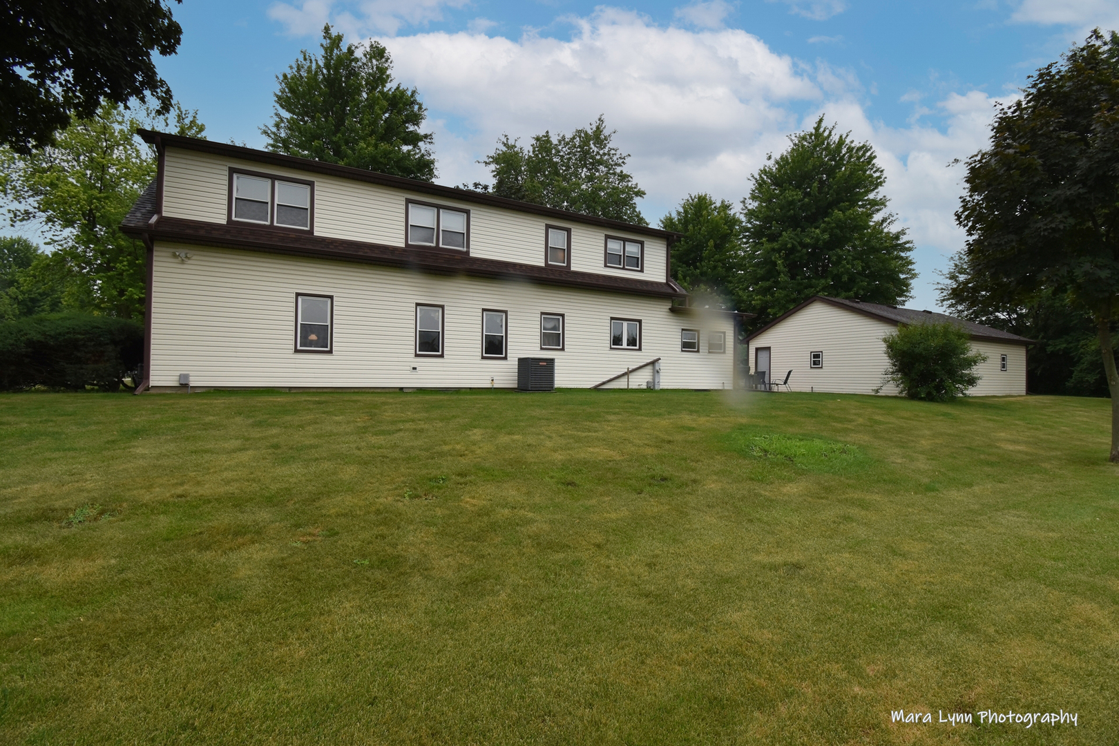 1250 Mettel Road Aurora, IL 60505 - Photo 44 of 49 a view of a house with a yard