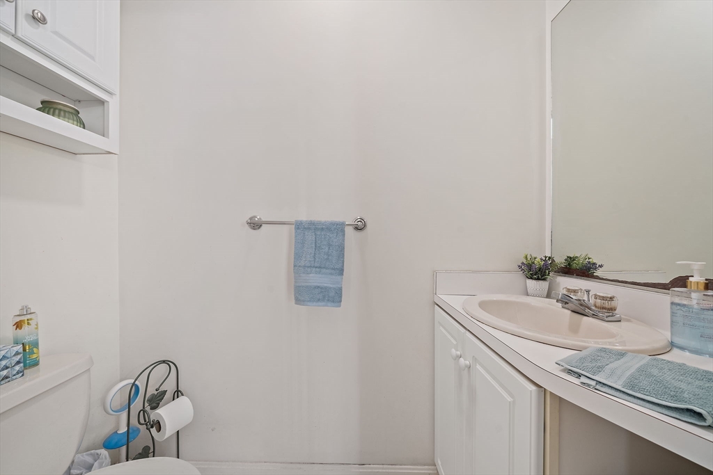 501 Auburn Street, Unit 404 Whitman, MA 02382 - Photo 19 of 35 a bathroom with a sink and a mirror