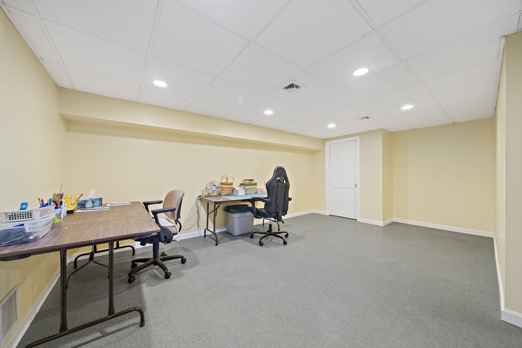 501 Auburn Street, Unit 404 Whitman, MA 02382 - Photo 26 of 35 a view of a workspace with furniture