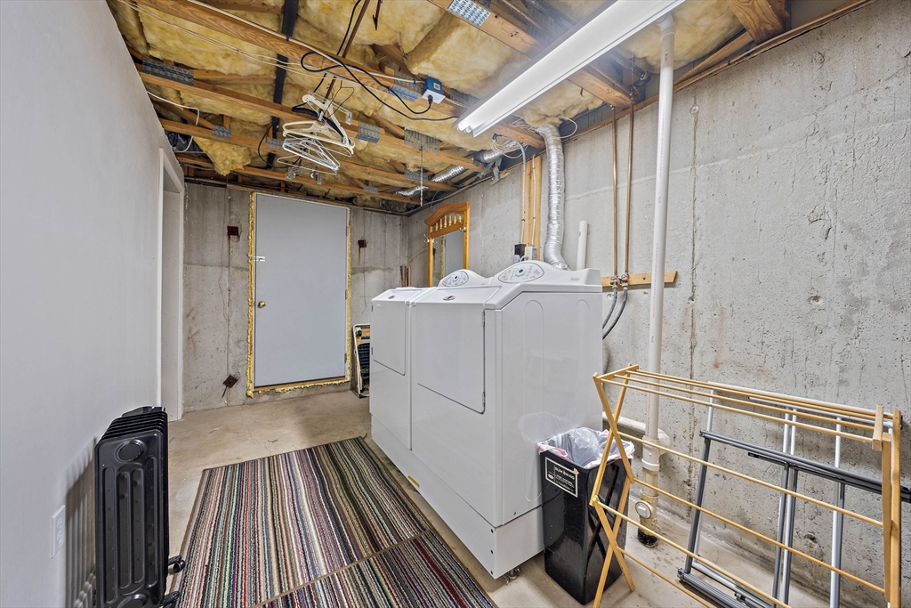 501 Auburn Street, Unit 404 Whitman, MA 02382 - Photo 27 of 35 a view of storage and utility room with wooden floor
