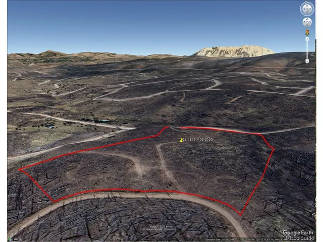 a view of a backyard of a house