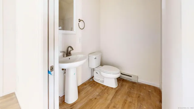 a bathroom with a sink and a toilet
