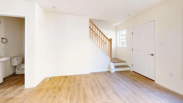 a view of a street with cars