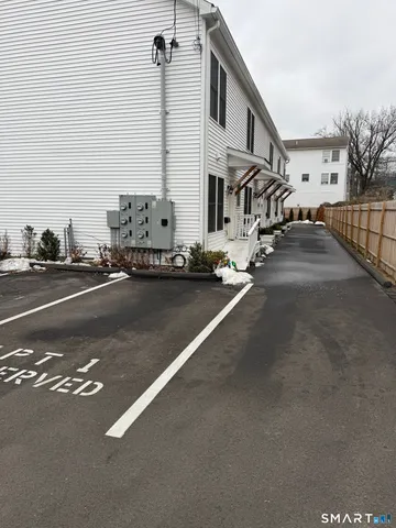 a view of a house with a street