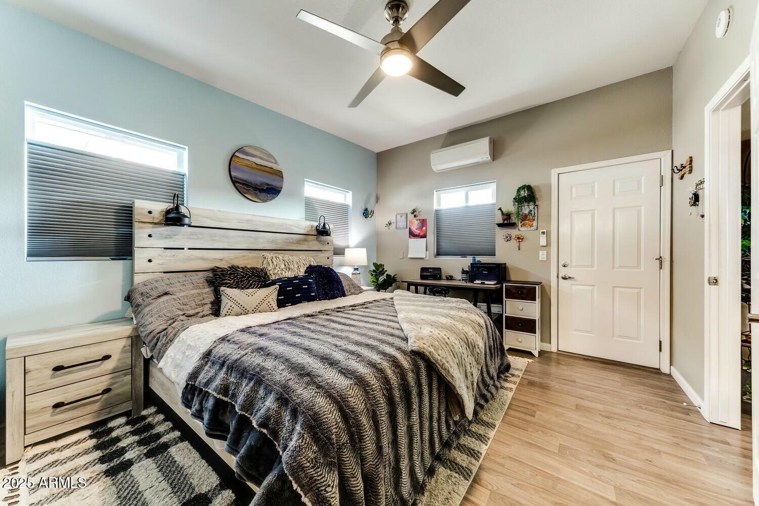 17200 West Bell Road, Unit 903 Surprise, AZ 85374 - Photo 14 of 21 a bedroom with bed and a window