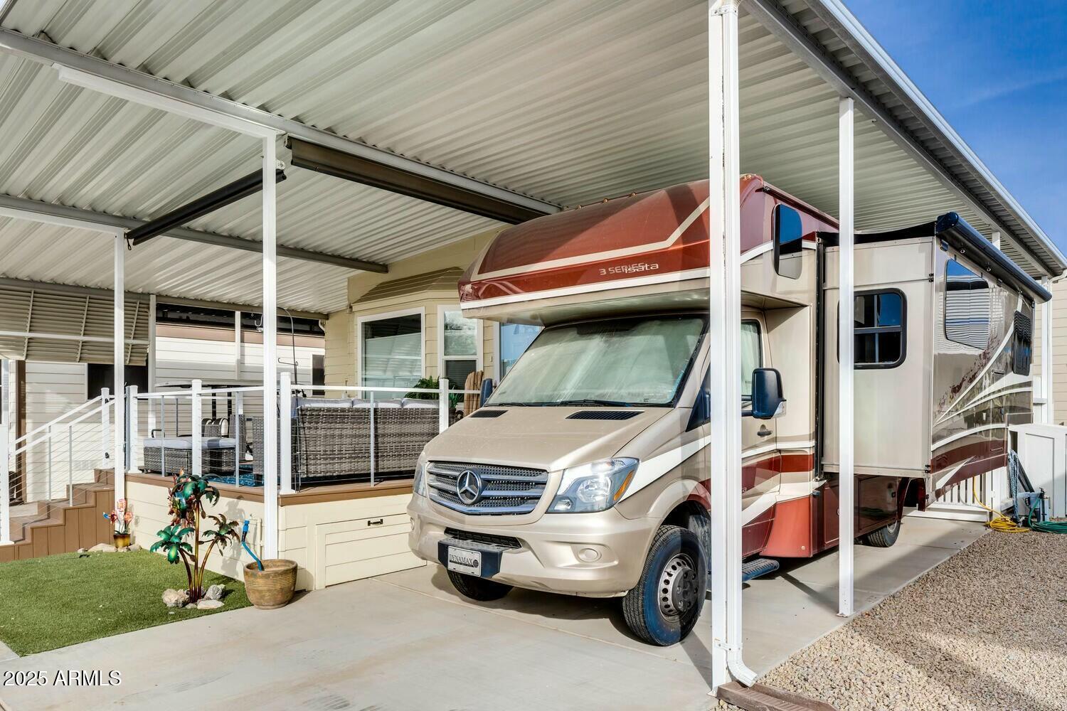 17200 West Bell Road, Unit 903 Surprise, AZ 85374 - Photo 4 of 21 a car parked in front of a house