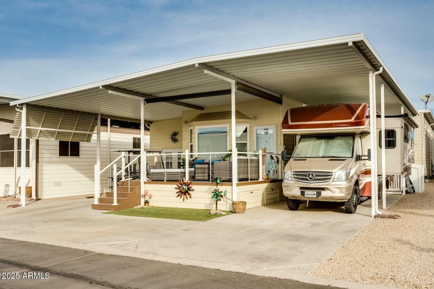17200 West Bell Road, Unit 903 Surprise, AZ 85374 - Photo 6 of 21 a car parked in front of a house