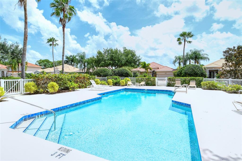 7717 US Open Loop Lakewood Ranch, FL 34202 - Photo 44 of 95 a view of a swimming pool with a patio