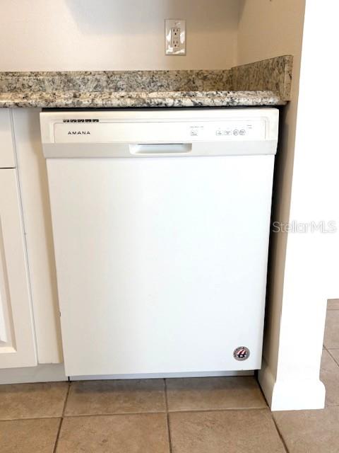 1901 Andover Way, Unit 38 Sun City Center, FL 33573 - Photo 14 of 33 a close view of washer and dryer