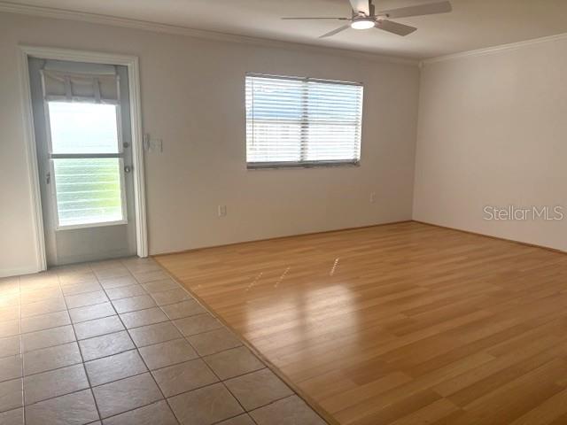 1901 Andover Way, Unit 38 Sun City Center, FL 33573 - Photo 6 of 33 a view of an empty room with a window