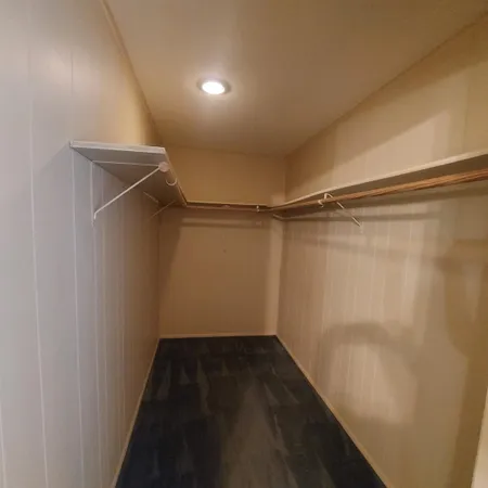 a view of a room with racks on the wall