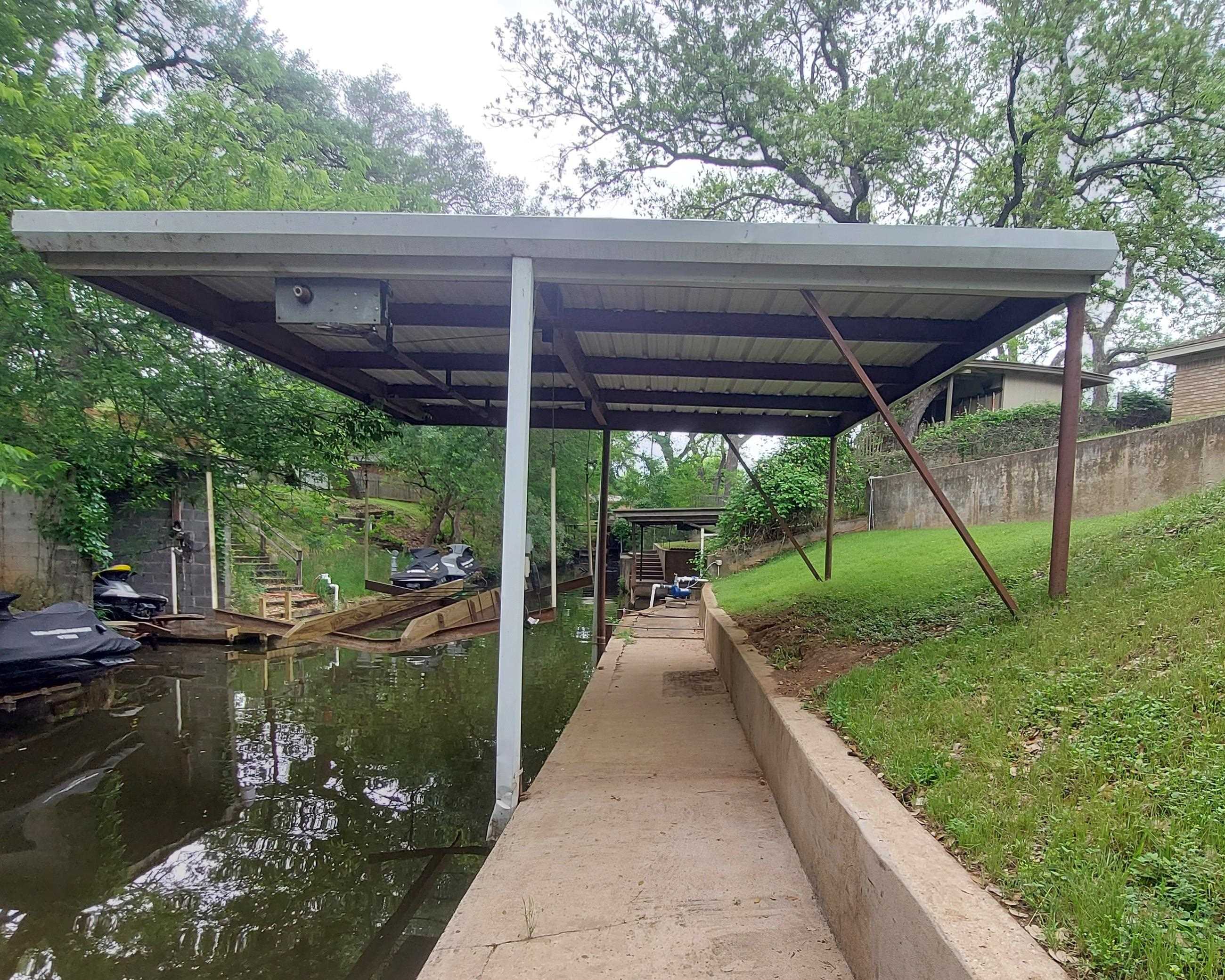 151 Riverside Drive Kingsland, TX 78639 - Photo 12 of 14 a view of swimming pool with a backyard