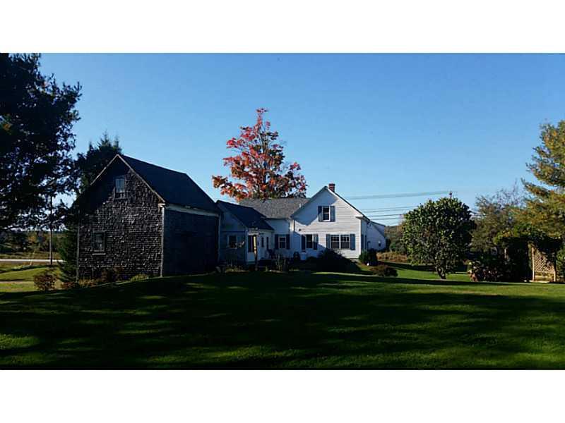 807 Gardiner Road Wales, ME 04280 - Photo 3 of 32 Exterior Back. The lush yard allows...
