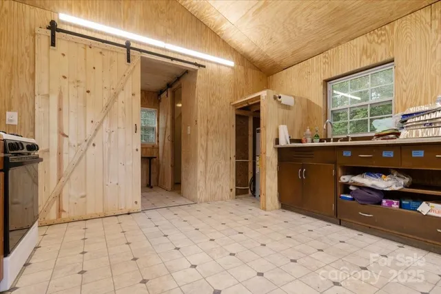 a bedroom with a bed and a cabinets