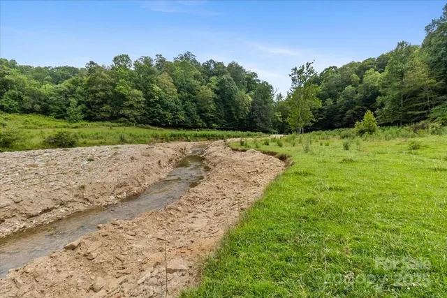 a view of a road with a yard