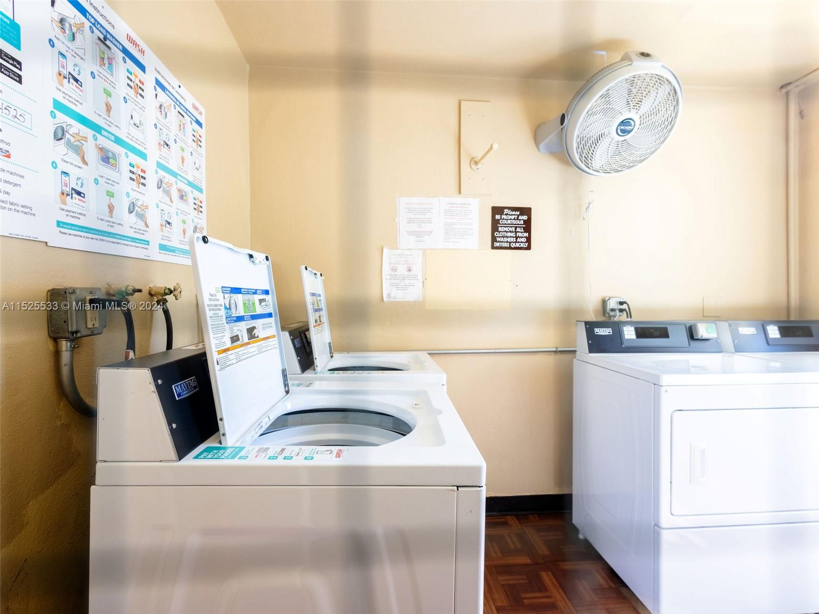 3285 Foxcroft Road, Unit E206 Miramar, FL 33025 - Photo 25 of 35 a utility room with dryer and washer