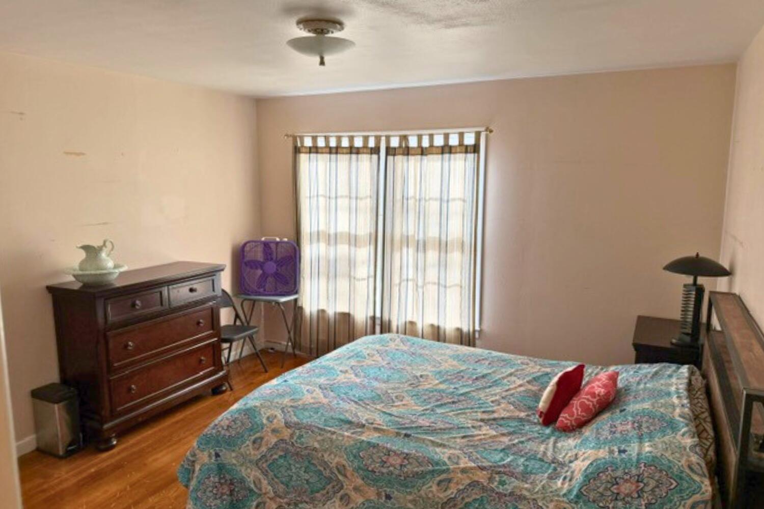 320 West Spruce Street Lockney, TX 79241 - Photo 22 of 24 a bedroom with a bed and a window