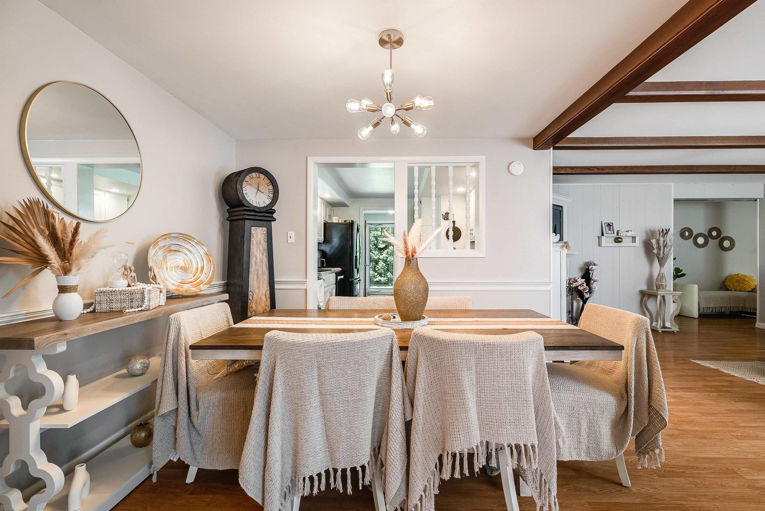1023 Greendale Road Harrisonburg, VA 22801 - Photo 15 of 53 a dining room with wooden floor a chandelier a wooden table and chairs