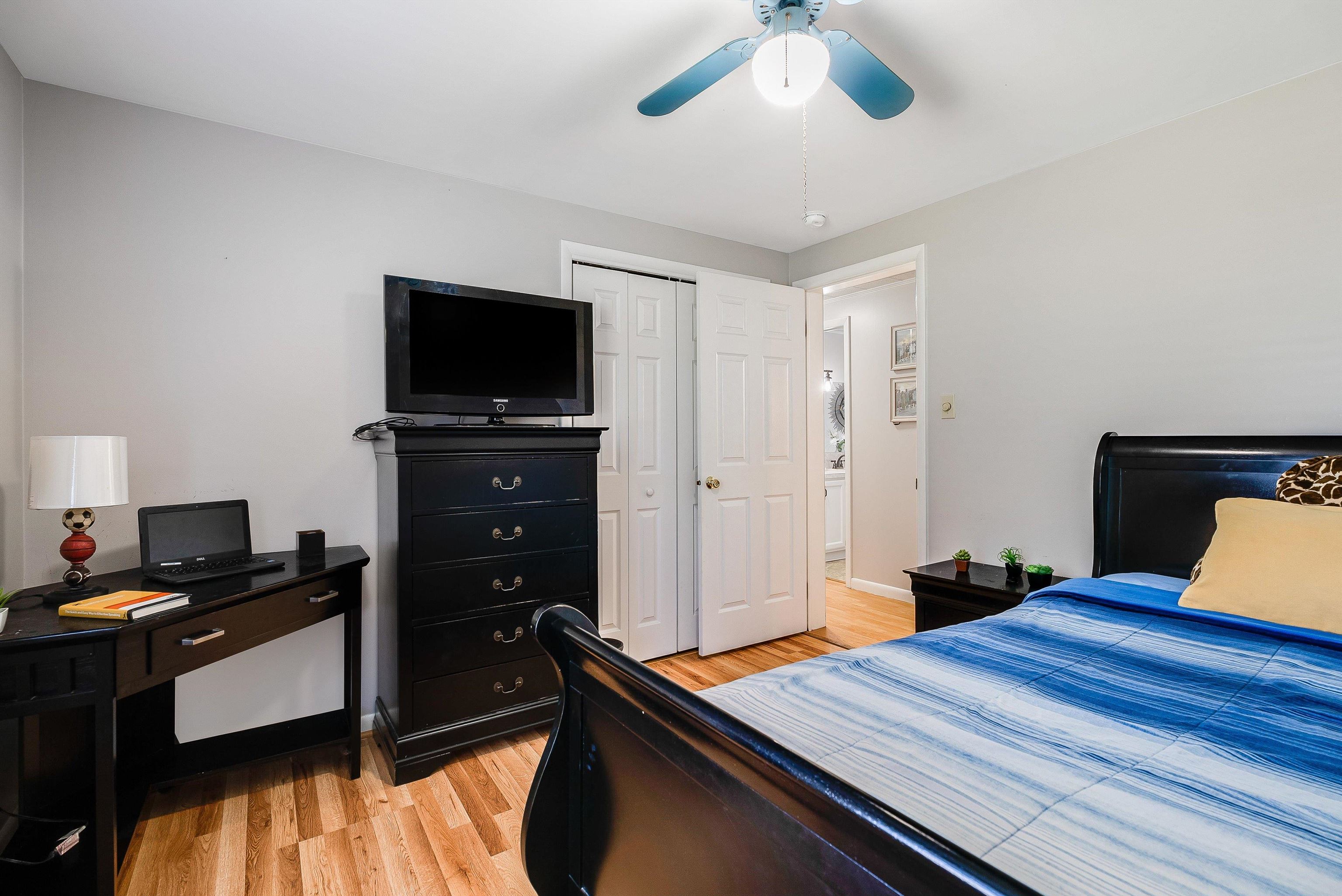 1023 Greendale Road Harrisonburg, VA 22801 - Photo 30 of 53 a bedroom with a bed and a flat tv screen