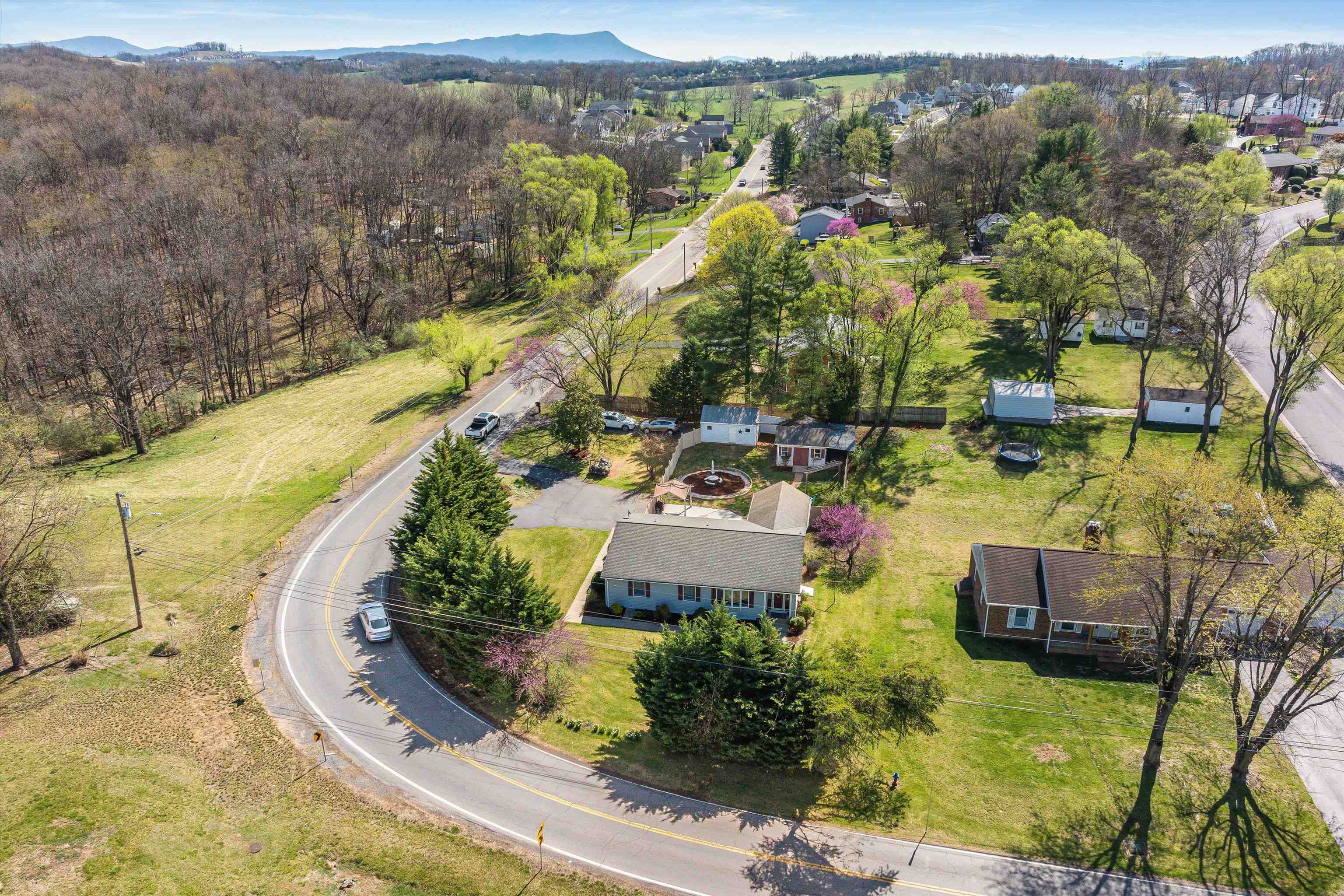 1023 Greendale Road Harrisonburg, VA 22801 - Photo 50 of 53 an aerial view of a house with a garden and lake view