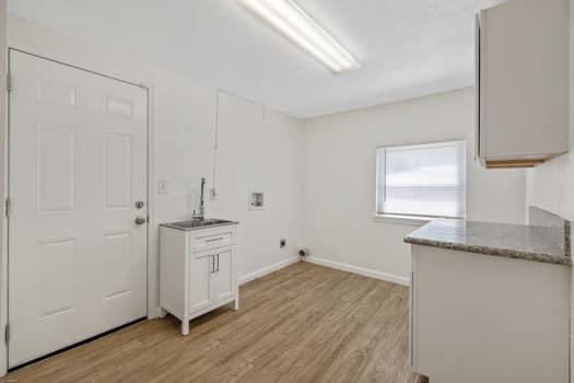 2982 D Street Selma, CA 93662 - Photo 18 of 25 a view of a kitchen with wooden floor