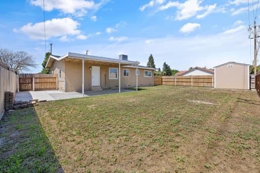 2982 D Street Selma, CA 93662 - Photo 22 of 25 a view of a house with a yard