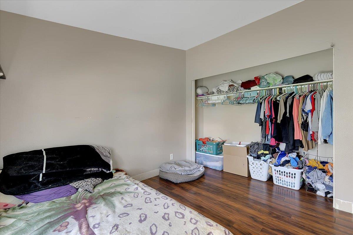 10268 Peoria Road Browns Valley, CA 95918 - Photo 14 of 57 a view of walk in closet with clothes and shoes