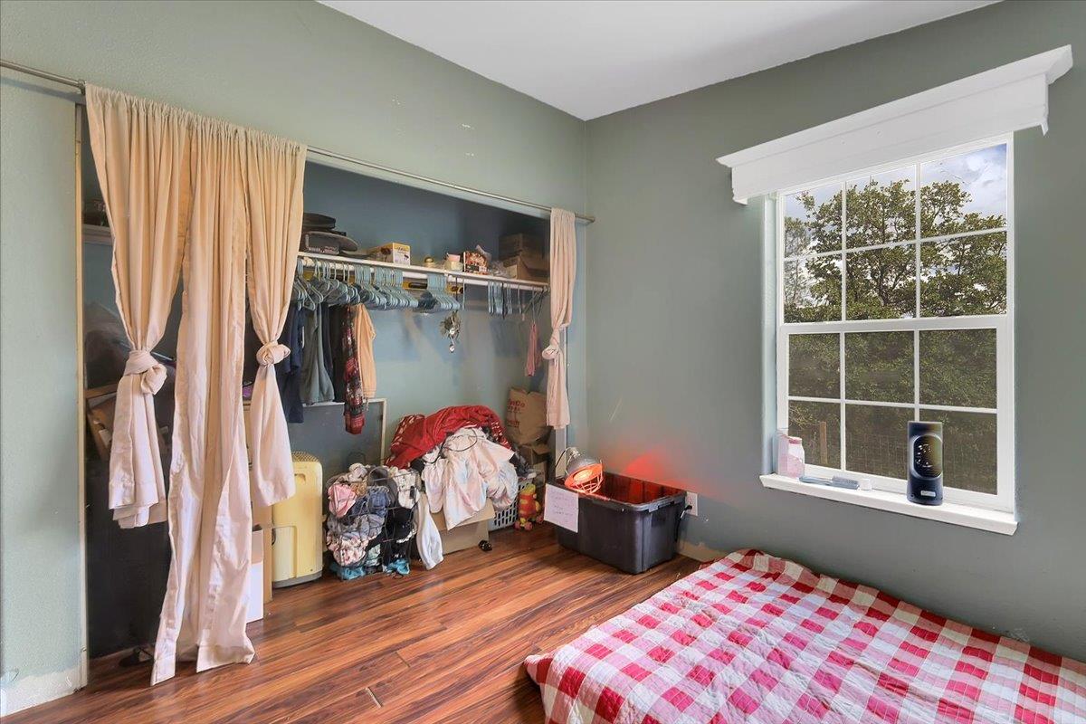 10268 Peoria Road Browns Valley, CA 95918 - Photo 16 of 57 a bedroom with bed and a window