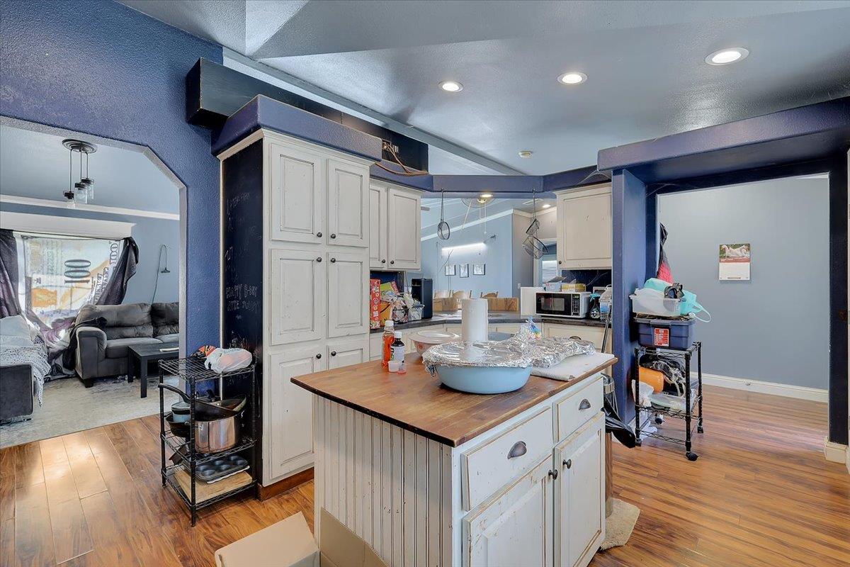 10268 Peoria Road Browns Valley, CA 95918 - Photo 28 of 57 a open kitchen with sink cabinets and wooden floor