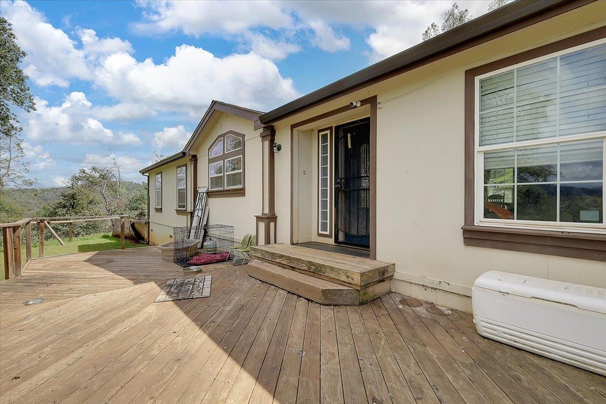 10268 Peoria Road Browns Valley, CA 95918 - Photo 3 of 57 a view of house with backyard and seating space