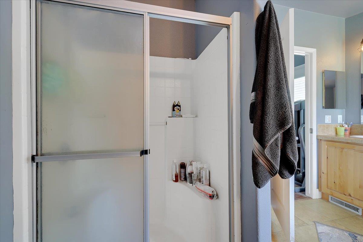 10268 Peoria Road Browns Valley, CA 95918 - Photo 35 of 57 a bathroom with a shower and a glass door