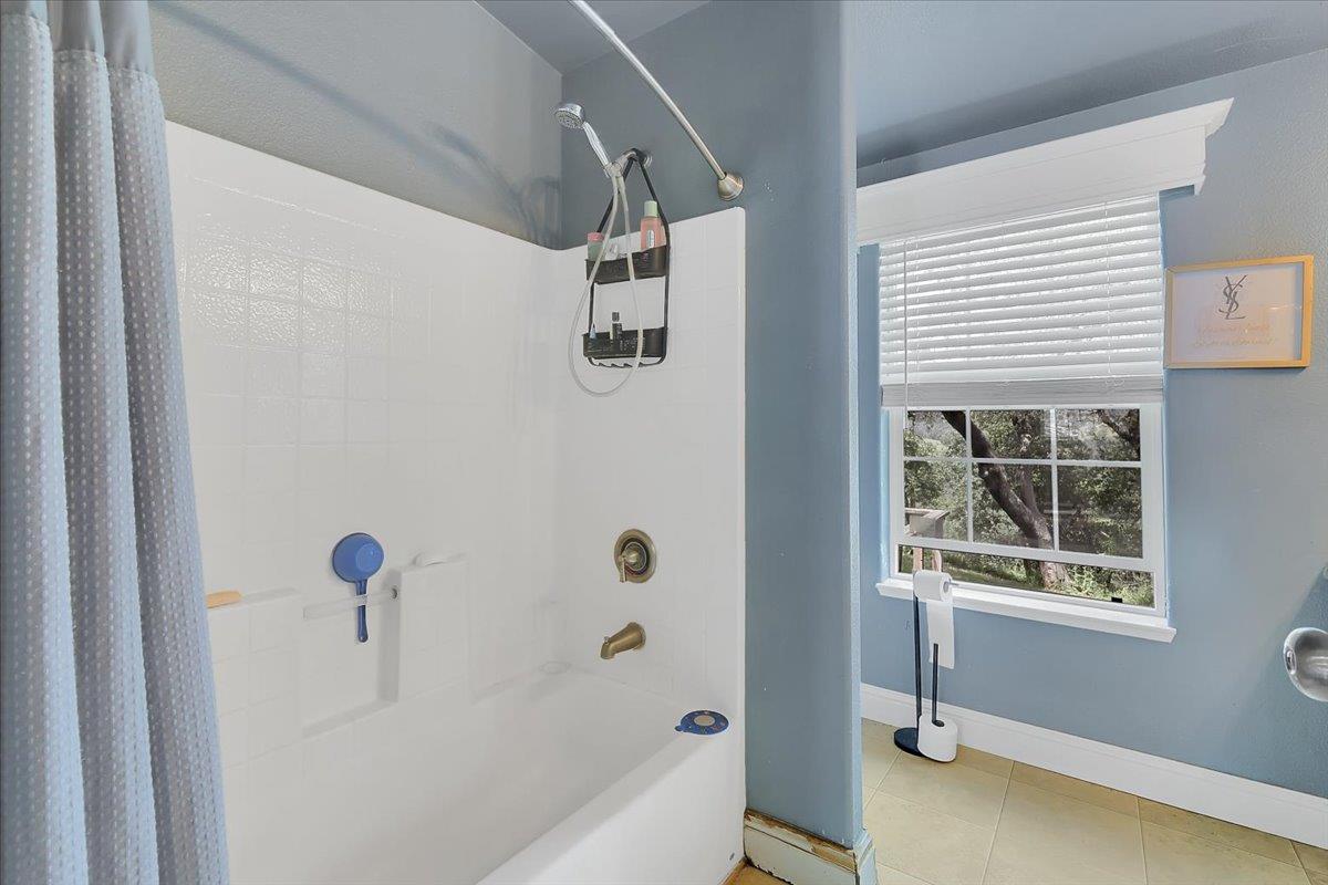 10268 Peoria Road Browns Valley, CA 95918 - Photo 10 of 57 a bathroom with a bathtub and a shower